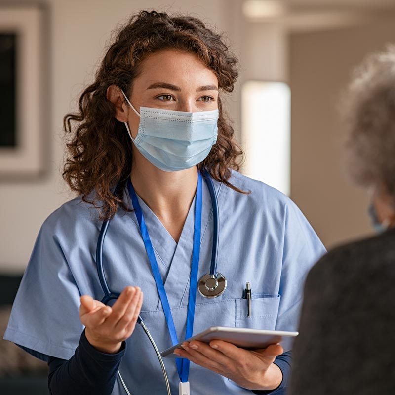caregiver with ipad