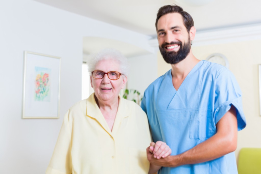 Young man holding senior woman hand